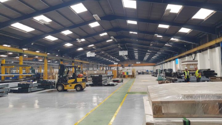 Inside a large, single-storey factory.
